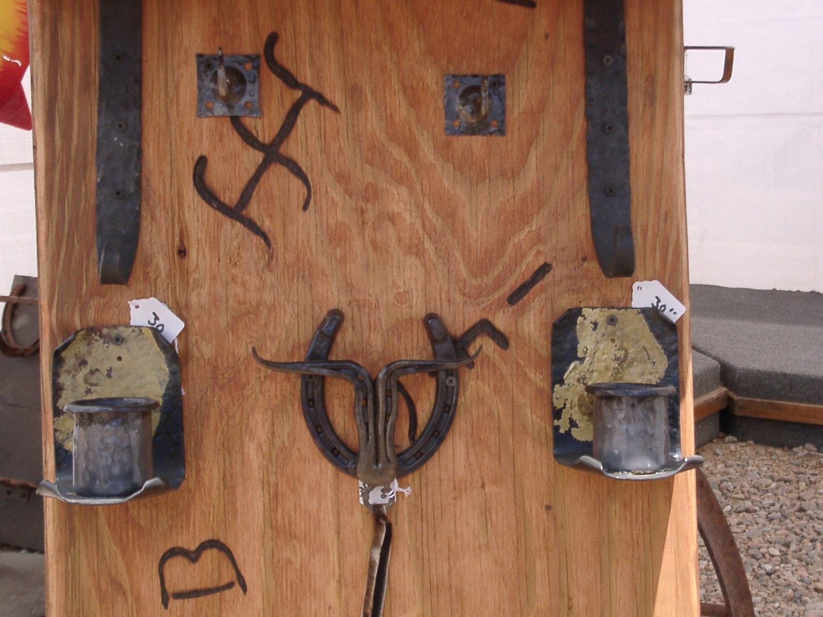 sconces and doorknocker